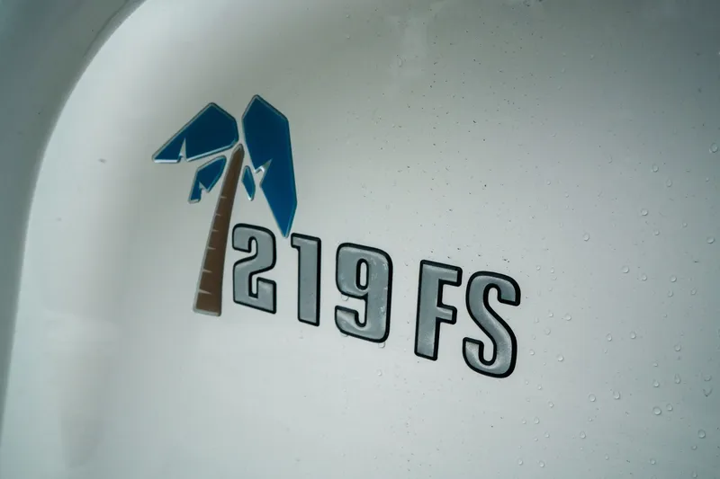 Slide: The Image of Key West 219 FS 2022 model logo with palm tree design on white surface. - 20