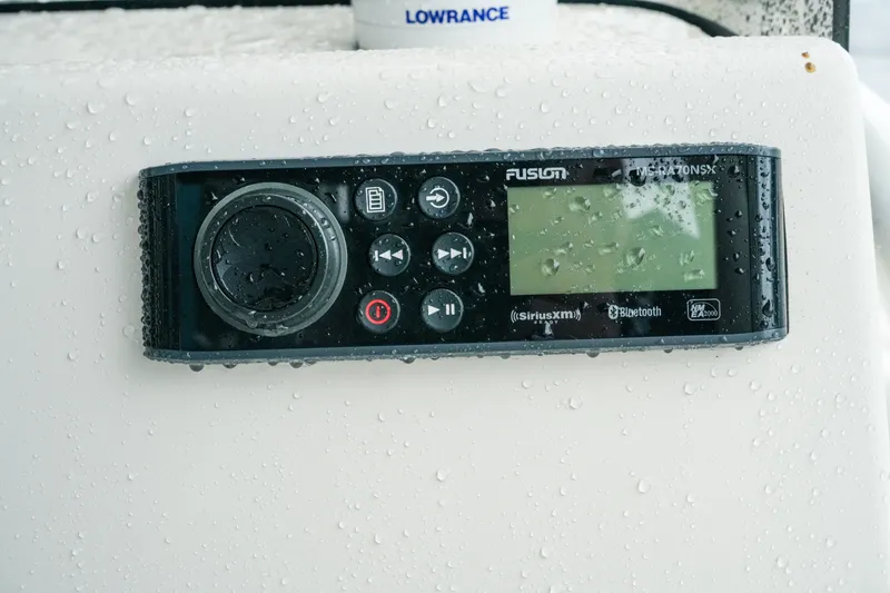 Slide: The Image of Wet Fusion marine stereo on 2022 Key West 219 FS boat dashboard. - 31