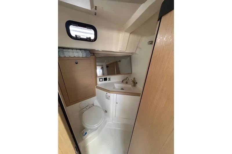 Slide: The Image of Bathroom interior of 2020 Beneteau Oceanis 461 yacht, featuring modern fixtures and compact design. - 22
