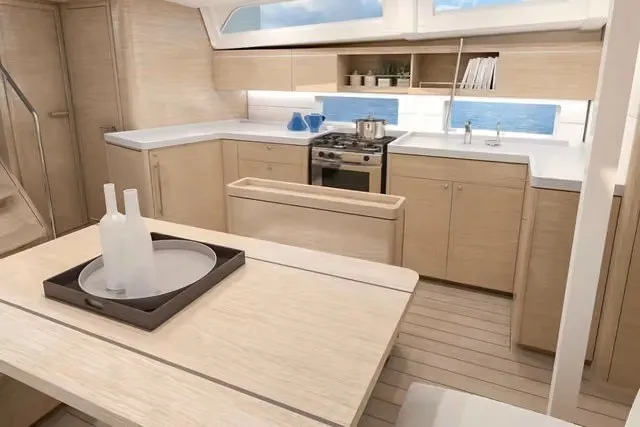 Slide: The Image of Modern kitchen interior of 2010 Oceanis 46.1 yacht with light wood finish. - 9