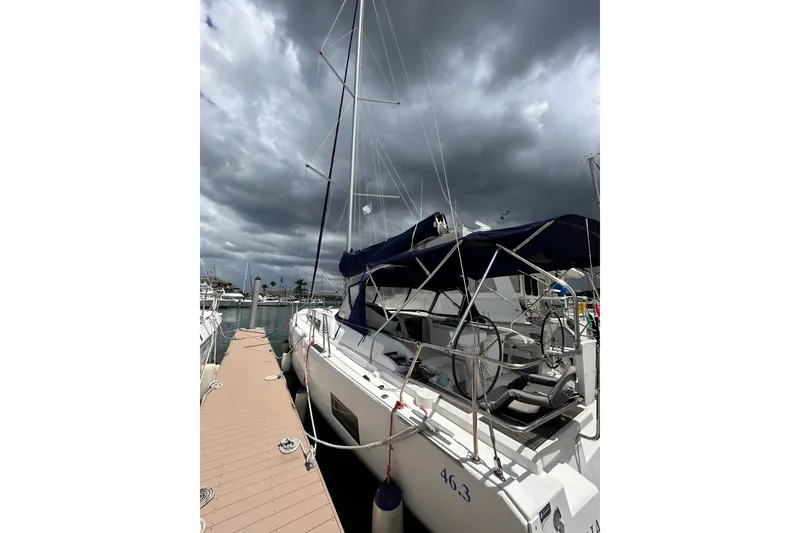 The Image of Sailboat Oceanis 46.1, 2010 model, docked under stormy skies. - 5