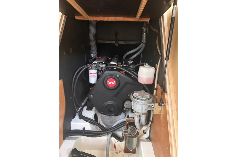 Slide: The Image of Engine compartment of a 2020 Beneteau Oceanis 461 sailboat, featuring a Yanmar engine. - 14