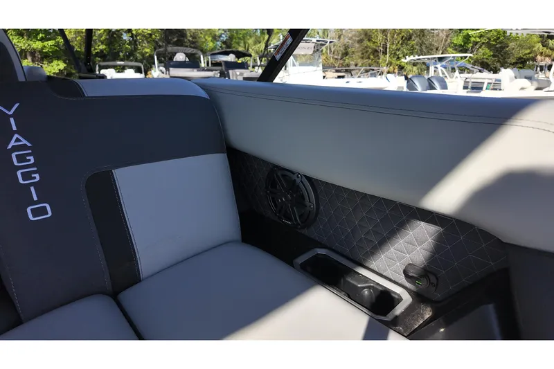 Slide: The Image of Interior of 2025 Viaggio Z24Q boat with stylish seating and speaker system. - 8