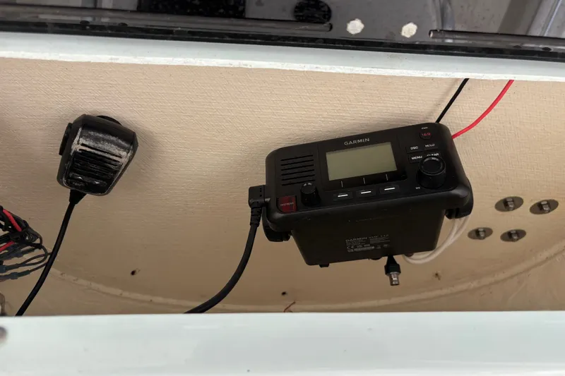 Slide: The Image of Garmin marine radio installed on 2025 Key West 239 FS boat dashboard. - 27