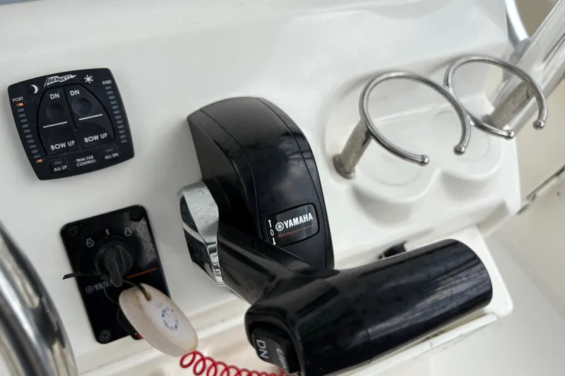 Slide: The Image of Control panel of 2025 Key West 239 FS boat featuring Yamaha throttle and trim tab controls. - 20
