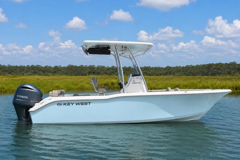 The Image of 2025 Key West 239 FS boat on calm water, featuring Yamaha outboard motor. - 0