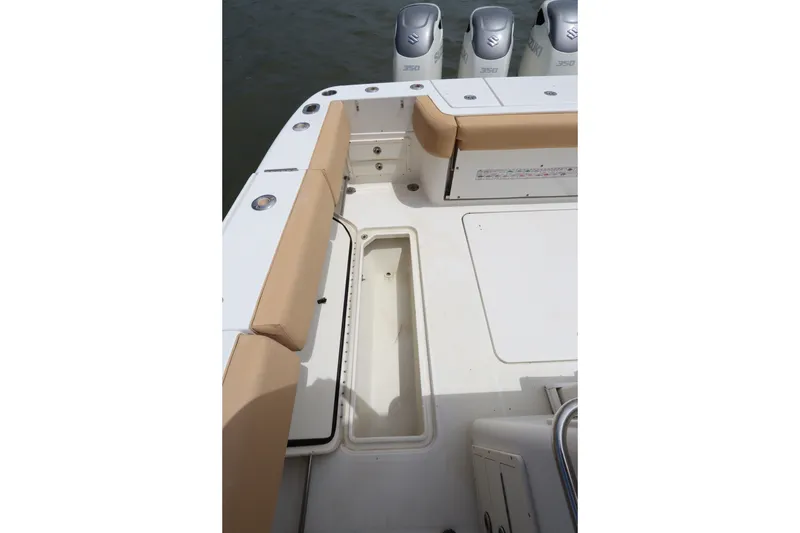 Slide: The Image of 2009 Hydra-Sports 4100 VSF boat deck with seating and storage compartments. - 54