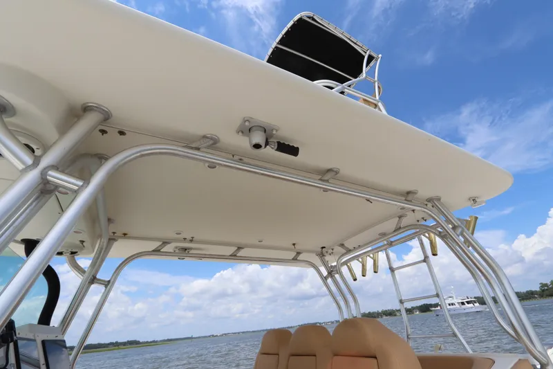 Slide: The Image of 2009 Hydra-Sports 4100 VSF boat with sturdy metal framework and open sky view. - 34