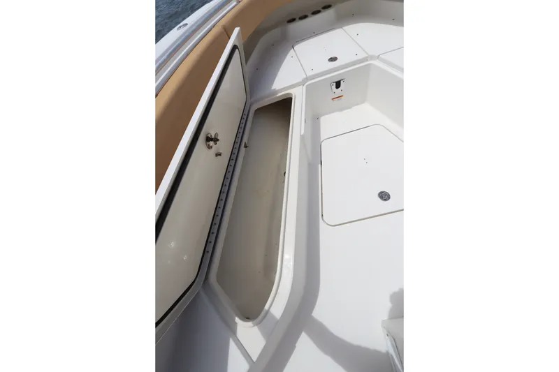 Slide: The Image of 2009 Hydra-Sports 4100 VSF boat interior storage compartment, open and spacious. - 49