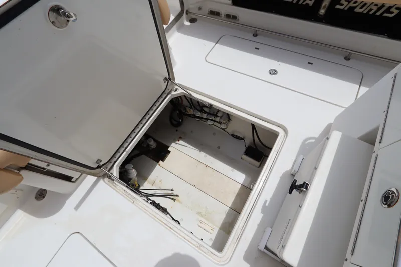 Slide: The Image of Open storage compartment on 2009 Hydra-Sports 4100 VSF boat deck. - 53