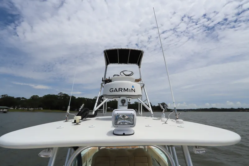 Slide: The Image of 2009 Hydra-Sports 4100 VSF boat with Garmin equipment on a calm lake under cloudy skies. - 61