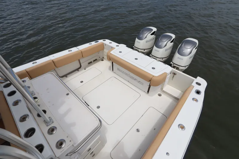 Slide: The Image of 2009 Hydra-Sports 4100 VSF boat deck with quad Suzuki outboard motors. - 9