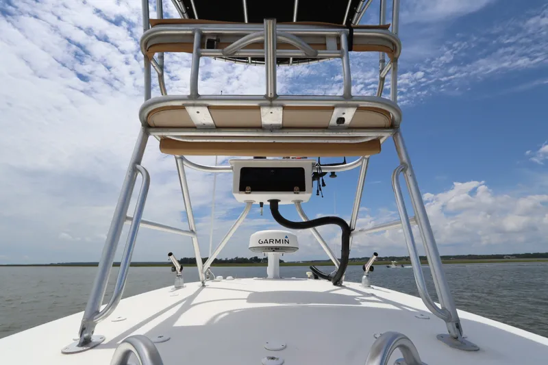 Slide: The Image of 2009 Hydra-Sports 4100 VSF boat with Garmin equipment, viewed from the deck under a blue sky. - 27