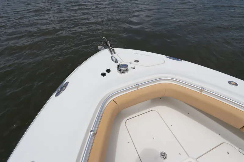 Slide: The Image of 2009 Hydra-Sports 4100 VSF boat bow with anchor, on calm water. - 6