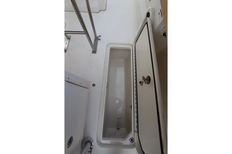 Slide: The Image of 2009 Hydra-Sports 4100 VSF boat storage compartment with open hatch. - 56