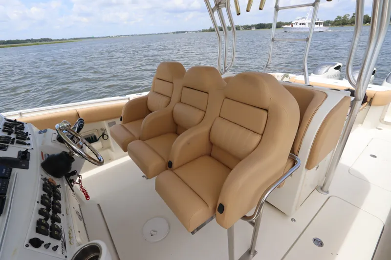 Slide: The Image of 2009 Hydra-Sports 4100 VSF boat interior with tan leather seats and control panel. - 33