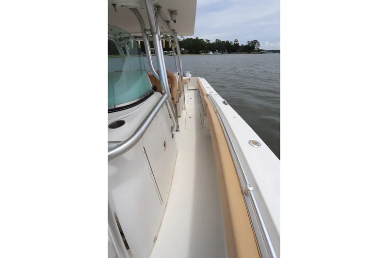 Slide: The Image of 2009 Hydra-Sports 4100 VSF boat deck view on calm water. - 59