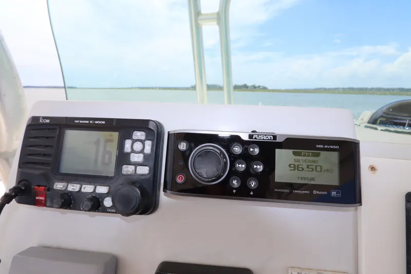 Slide: The Image of Boat dashboard with Icom VHF radio and Fusion stereo, Hydra-Sports 4100 VSF, 2009 model. - 43