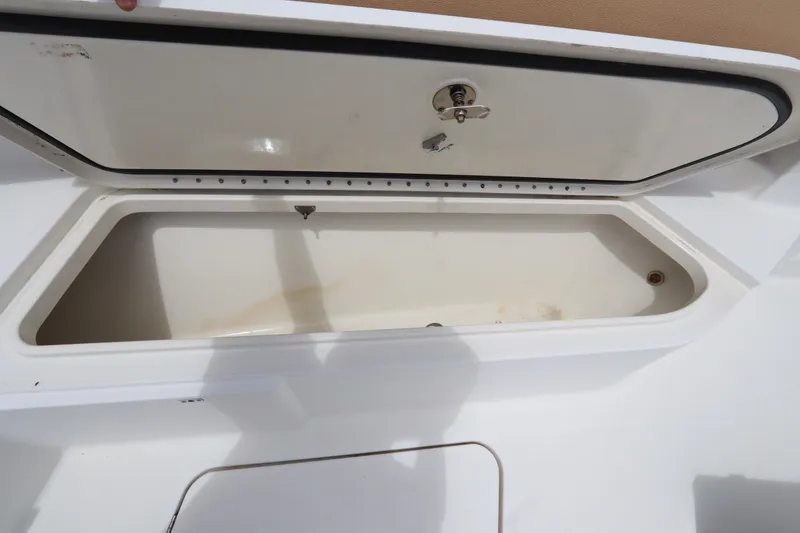 Slide: The Image of Open storage compartment on a 2009 Hydra-Sports 4100 VSF boat. - 50
