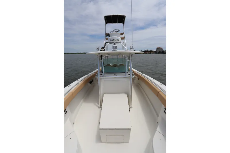 Slide: The Image of 2009 Hydra-Sports 4100 VSF boat on water, featuring center console and Garmin equipment. - 8