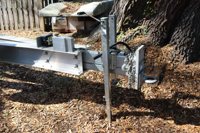 Slide: The Image of Trailer hitch of a 2009 Hydra-Sports 4100 VSF on leaf-covered ground. - 66