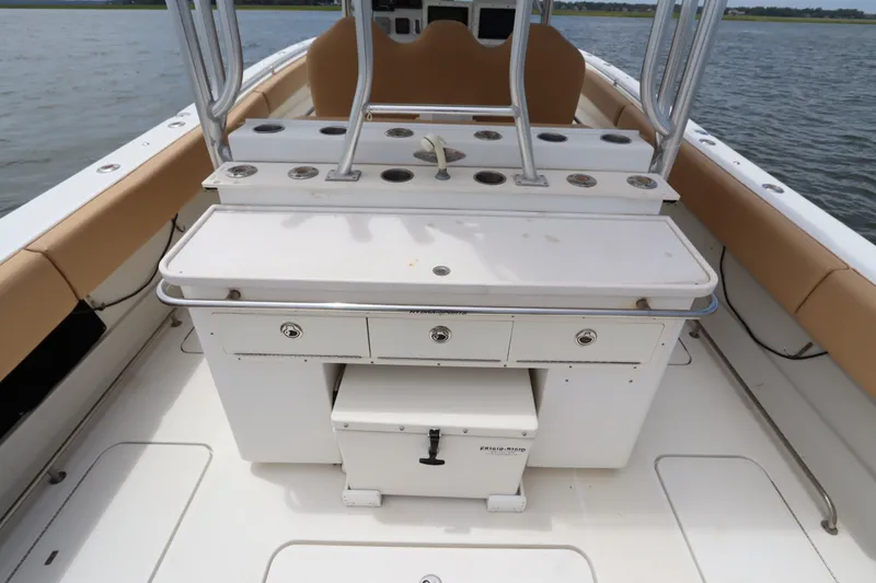 Slide: The Image of 2009 Hydra-Sports 4100 VSF boat interior with fishing station and seating. - 19