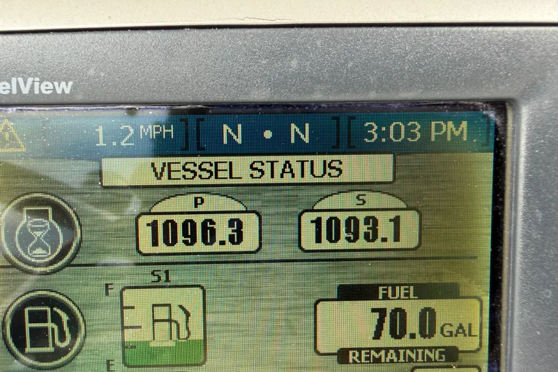 Slide: The Image of Display screen showing vessel status and fuel level on a 2006 Boston Whaler 270 Outrage. - 18