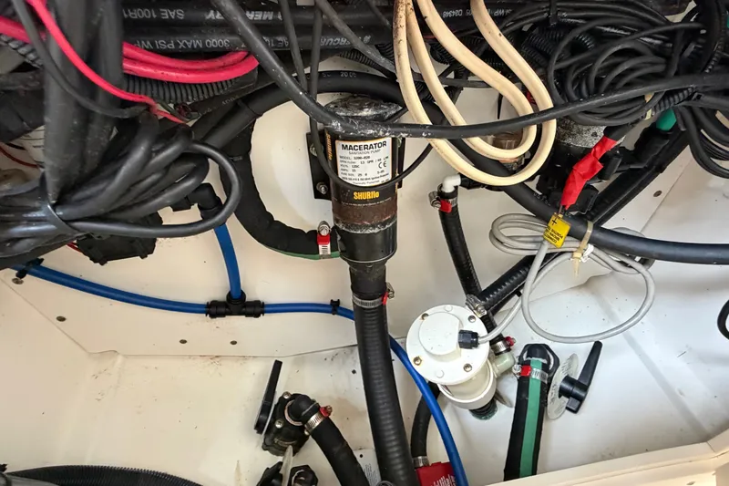 Slide: The Image of 2006 Boston Whaler 270 Outrage boat wiring and plumbing system close-up. - 46