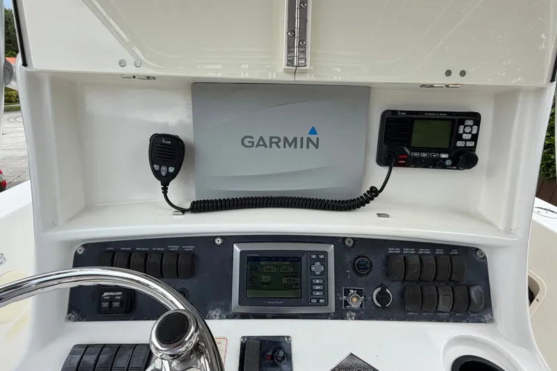 Slide: The Image of Control panel of a 2006 Boston Whaler 270 Outrage with Garmin and Icom electronics. - 20