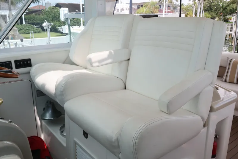 Slide: The Image of White leather captain's chairs on 2006 Sea Ray 40 Motor Yacht helm. - 25