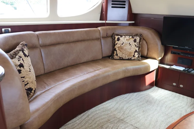Slide: The Image of Luxurious interior of 2006 Sea Ray 40 Motor Yacht with plush seating and elegant decor. - 29