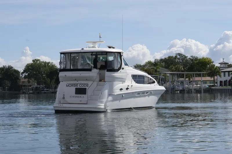 Slide: The Image of 2006 Sea Ray 40 Motor Yacht on calm water, St. Petersburg, Florida. - 3