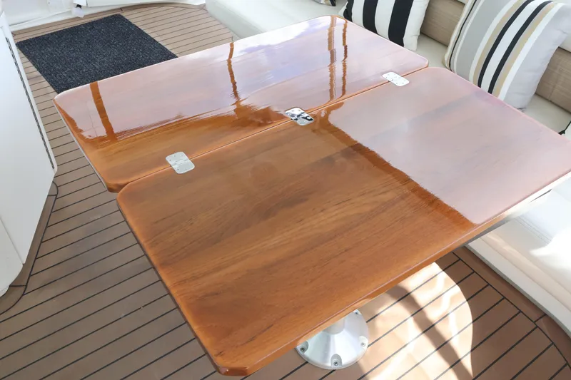 Slide: The Image of Polished wooden table on 2006 Sea Ray 40 Motor Yacht deck. - 13
