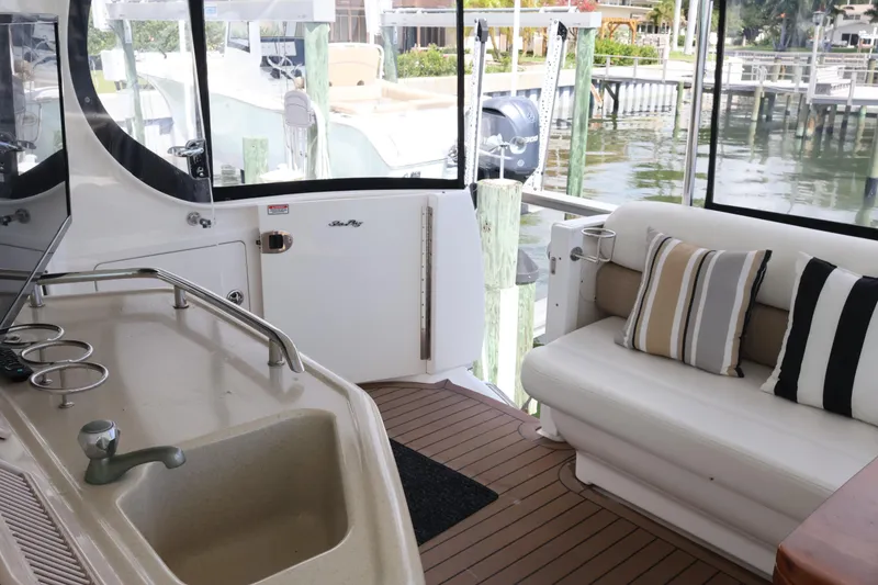 Slide: The Image of Interior of 2006 Sea Ray 40 Motor Yacht with seating and kitchenette. - 15