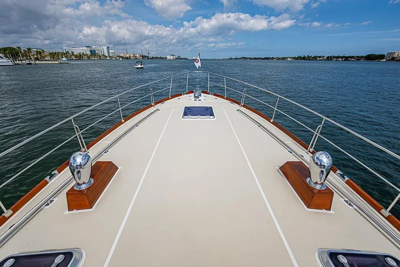 Slide: The Image of 2001 Grand Banks 49 Eastbay HX yacht deck with ocean view and clear sky. - 18
