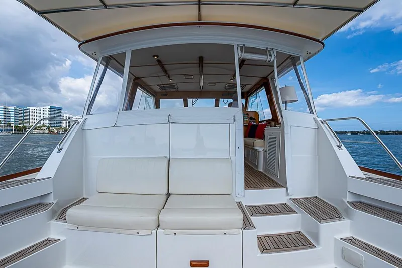 Slide: The Image of 2001 Grand Banks 49 Eastbay HX yacht with spacious seating and ocean view. - 14
