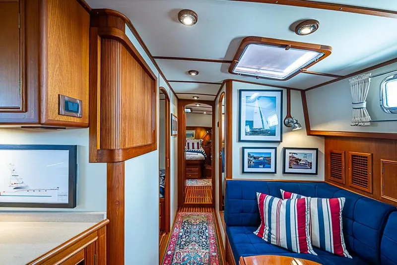 Slide: The Image of Luxurious interior of 2001 Grand Banks 49 Eastbay HX yacht with elegant wood finishes. - 39