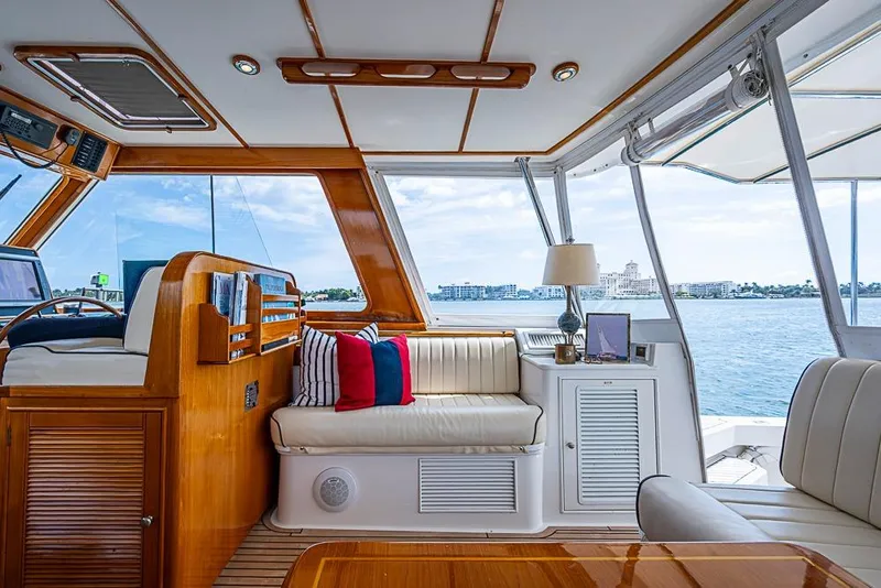 Slide: The Image of Luxurious interior of 2001 Grand Banks 49 Eastbay HX yacht with waterfront view. - 26
