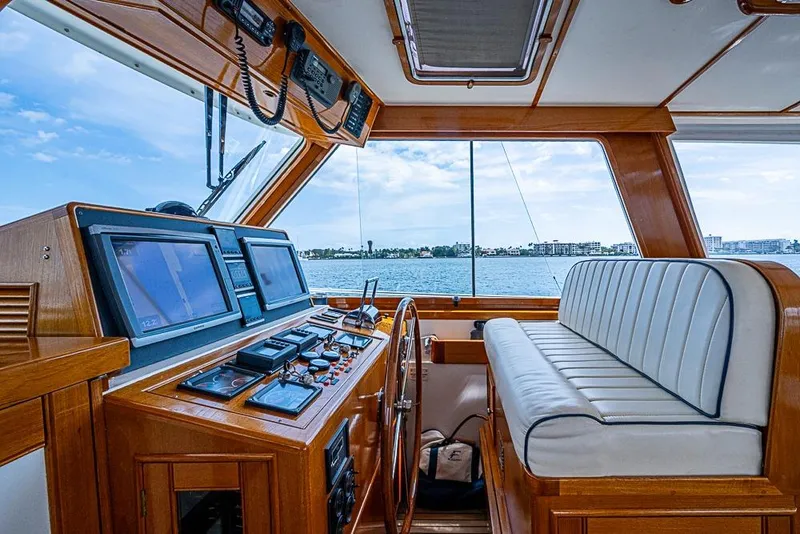 Slide: The Image of Interior of 2001 Grand Banks 49 Eastbay HX yacht with navigation equipment and seating. - 33