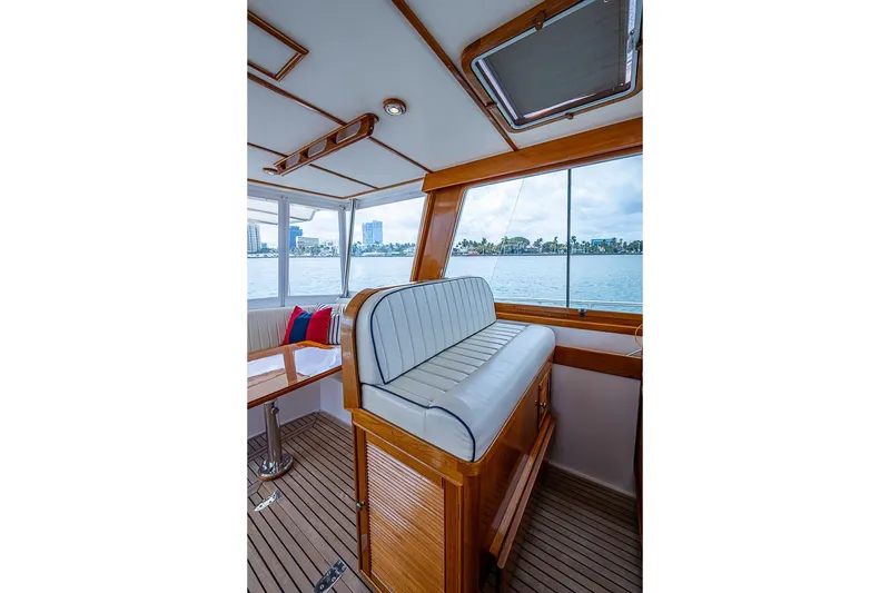 Slide: The Image of Interior of 2001 Grand Banks 49 Eastbay HX yacht with waterfront view. - 30