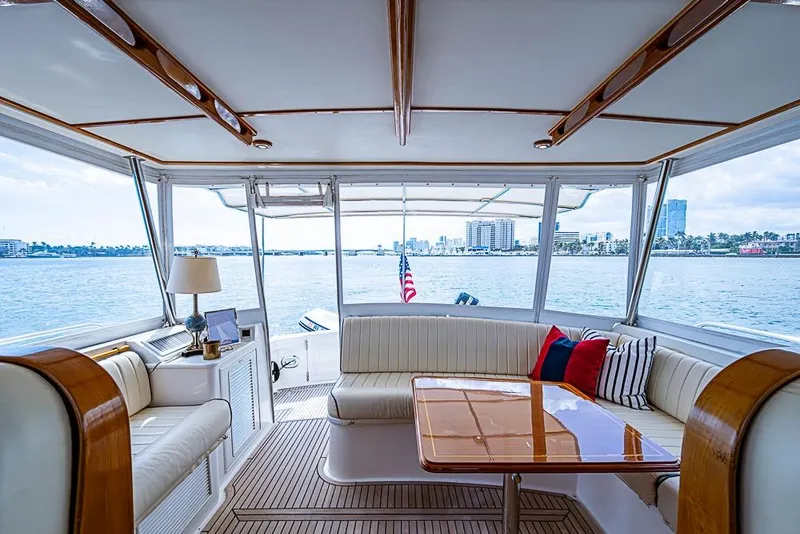 Slide: The Image of Luxurious 2001 Grand Banks 49 Eastbay HX yacht interior with waterfront view. - 23