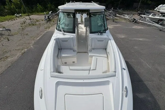 Slide: The Image of 2027 Tiara Yachts 34 LX boat with spacious seating and sleek design. - 27
