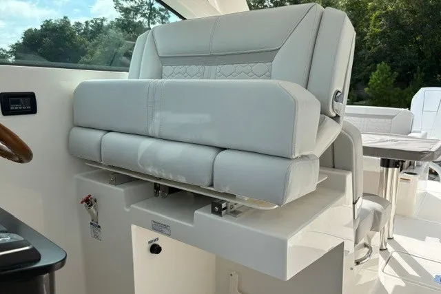 Slide: The Image of Luxurious seating on 2027 Tiara Yachts 34 LX, featuring elegant design and premium materials. - 21