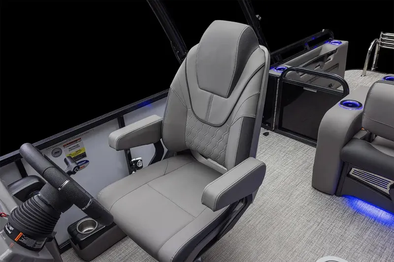 Slide: The Image of Manufacturer Provided Image: 2025 Tahoe Pontoon LTZ Versatile Rear Bench Windshield interior with luxurious seating. - 2