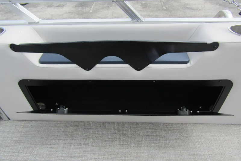 Slide: The Image of 2026 Tahoe Pontoon LTZ Versatile Rear Bench Wind Shield interior detail, showcasing storage compartment. - 27