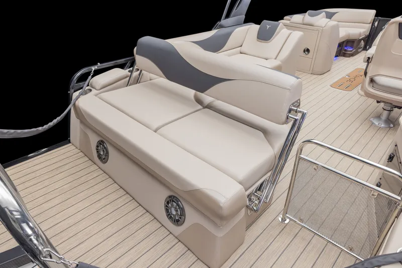 Slide: The Image of 2026 Tahoe Pontoon LTZ Versatile Rear Bench Wind Shield 23 with luxurious seating and sleek design. - 6