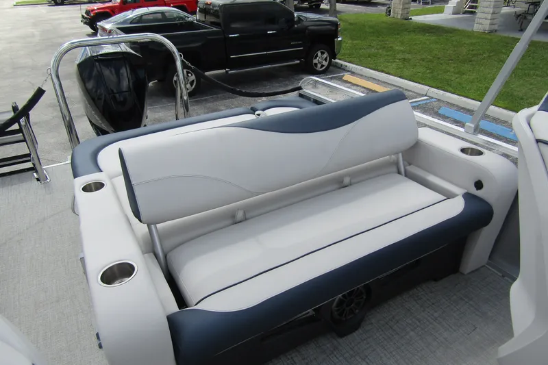 Slide: The Image of 2026 Tahoe Pontoon LTZ Versatile Rear Bench with Wind Shield, featuring sleek seating design. - 24
