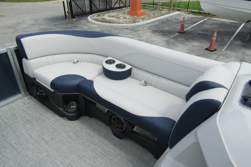 Slide: The Image of 2026 Tahoe Pontoon LTZ Versatile Rear Bench with cup holders and speakers. - 12
