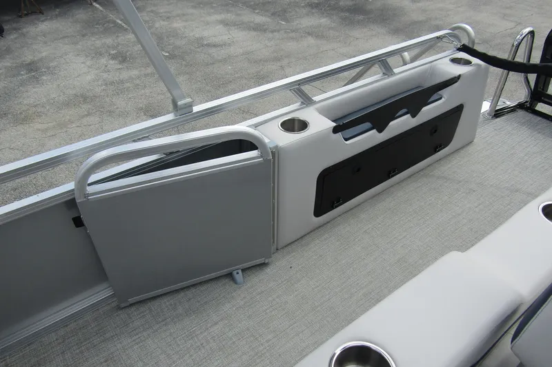 Slide: The Image of 2026 Tahoe Pontoon LTZ Versatile Rear Bench Wind Shield, interior view with seating and cup holders. - 26