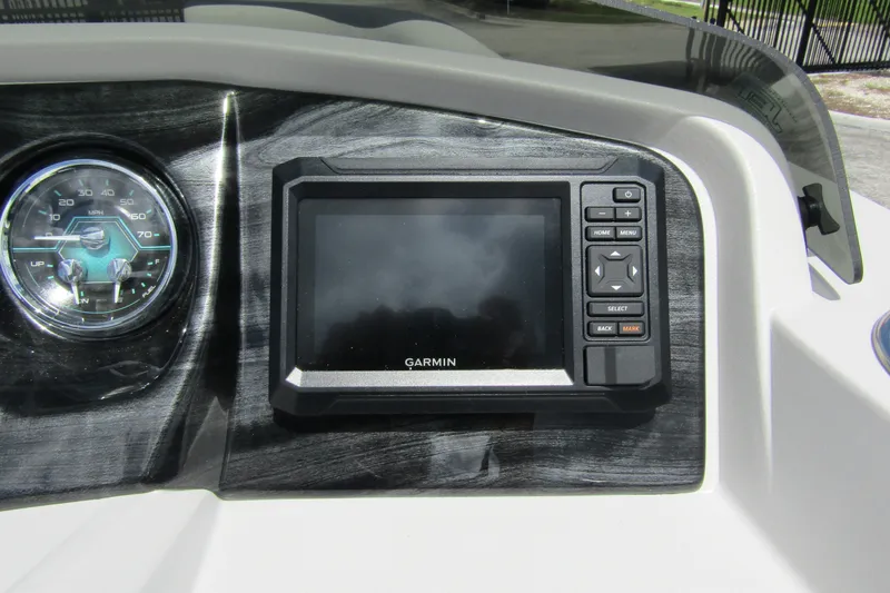 Slide: The Image of Dashboard of 2026 Tahoe Pontoon LTZ with Garmin display and speedometer. - 19